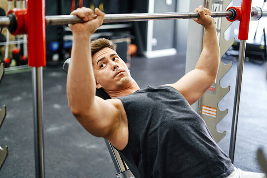 Strong Man Athlete Lifting Barbell