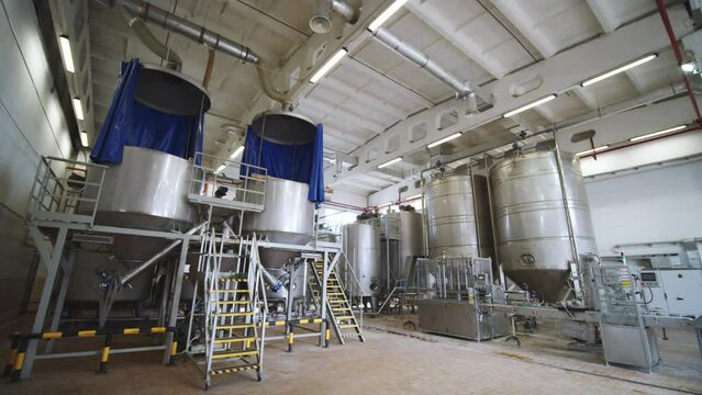 Production Tanks on Food Factory Wide Angle Shot