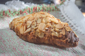 Almond Croissant Bakery homemade. Traditional French breakfast and crispy croissant, natural light