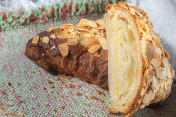 Almond Croissant Bakery homemade. Traditional French breakfast and crispy croissant, natural light
