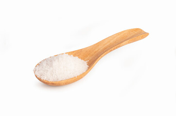 Salt in a wooden spoon on white 