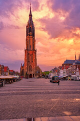 Fototapeta na wymiar Nieuwe Kerk New Church protestant church on Delft Market Square Markt with people