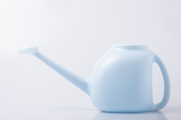 Watering can on white background.