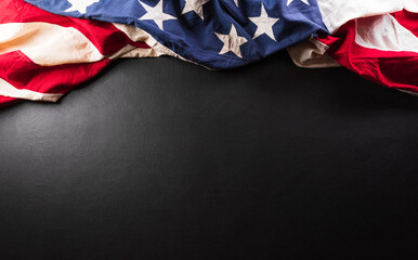 Happy Independence day concept made from American flag on dark wooden background.