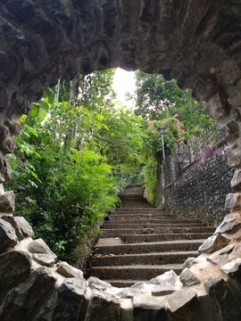 rocky stairway viewed from cave hole