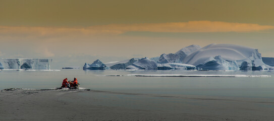 Inflatable Boats Explore Icebergs in Antarctica