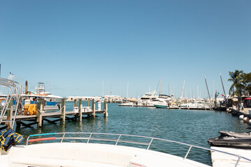 Point of view from a yacht to other yachts and a clear blue sky