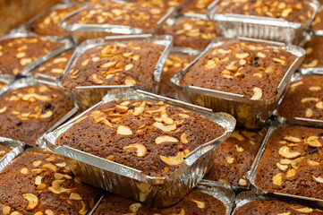 Plain plum Cakes are being sold at Nahoum and Sons, New Market area. Very famous and more than 100 years old cake shop in Kolkata, West Bengal, India. Cakes are considered as heritage of Kolkata.