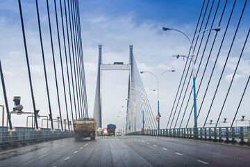 Obraz premium Vidyasagar Setu (Bridge) over river Ganges, known as 2nd Hooghly Bridge in Kolkata,West Bengal,India. Connects Howrah and Kolkata, two big cities of West Bengal. Longest Cable - stayed bridge, India.