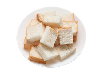 Slices toast bread in dish on white background