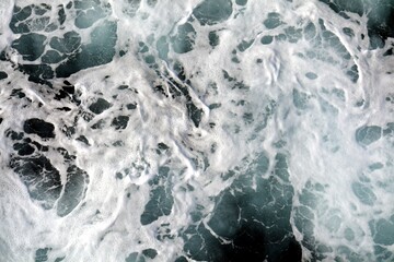 Icy waves, sea background, water drops on a glass