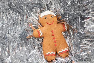 Gingerbread man in shiny silver tinsel
