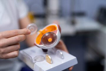 Optometry lens examination. Eyesight hospital equipment.