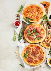 Fotobehang Set of delicious homemade pizzas. © bit24