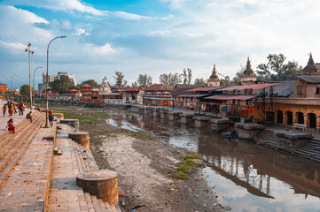 Stairs and Terraces of the South Baghmati River in Kathmandu near the Pashupatinath Temple. It is here that the bodies of ordinary mortals are burned. Along the river are pedestals for the cremation o