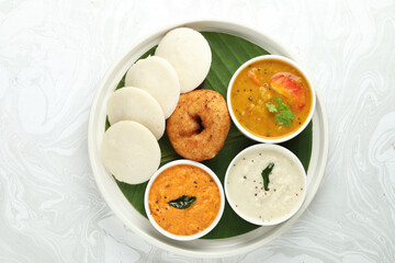 idli vada with sambar , sambhar also called medu wada rice cake