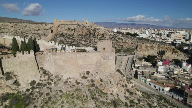 Baluarte del Saliente tower in Almeria Alcazaba, Spain. Aerial orbiting