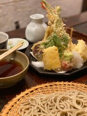 Japanese Tempura dish with buckwheat Soba plates, dinner dining out downtown Tokyo Japan year 2022 May 19th
