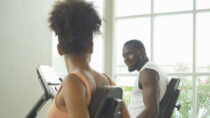 Black African american healthy couple, people, using fitness equipment, doing exercise, working...