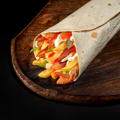 chicken shawarma, doner kebab burrito filling for, fries and chicken with pita bread, dish on a...