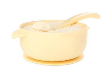 Dry healthy baby food in bowl on white background