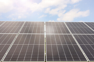 Solar panels outdoors on sunny day. Alternative energy