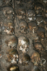 Skulls inside of the Chapel of Bones (Capela dos Ossos) in de San Francisco church (Igreja do Sao Francisco) in Evora, Alentejo, Portugal, Europe