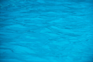 Water in swimming pool, background with high resolution. Wave abstract or rippled water texture.