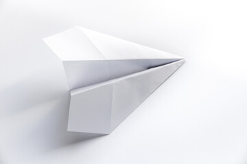 Paper plane origami isolated on a white background