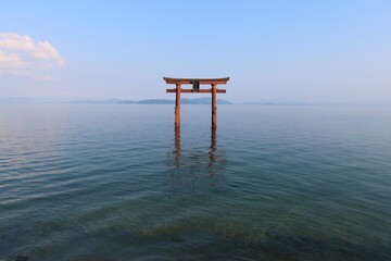 The torii of Shirahige-jinjya Shrine which stands in the water of Biwa-ko Lake in Takashima City in...