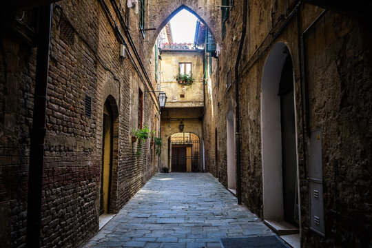 Fototapeta colorful street view of siena city, italy