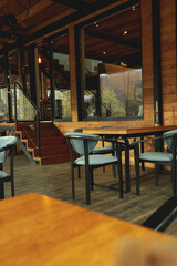 Photo of cozy wooden restaurant in mountain resort