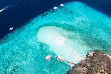 The aerial view with a lagoon as white sand beach with tourists and turquoise water Cebu, Philippines-Summer travel concept