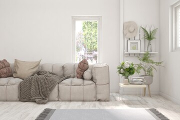 White living room with sofa and summer landscape in window. Scandinavian interior design. 3D illustration