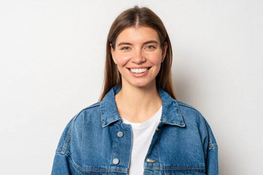 Portrait of happy youthful beautiful woman wearing casual jean jacket