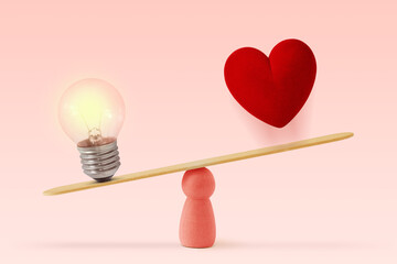 Light bulb and heart on scale on pink background - Concept of woman and brain priority over heart in life