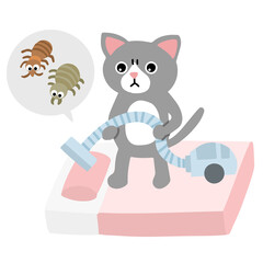 布団のノミ、ダニを掃除機で吸い取る三毛猫
