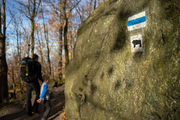 Tourist trail designation. People in the background