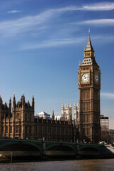 Fototapeta na wymiar The landmark of London the Parliament and the Westminster bridge with blue sky
