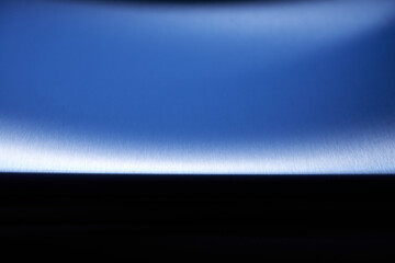 Stainless steel texture. Metal texture. Texture of stainless steel with an accent of light. A beam...