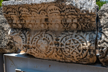 Carved decorative lintel at the ruins of Capernaum in Israel other names Kfar Nahum or Capharnaum.
