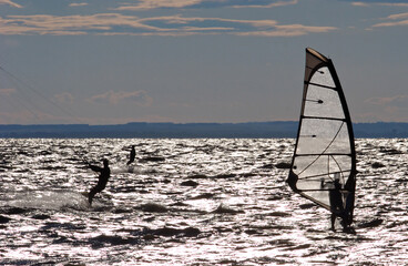 Windsurfing at overcasted sky Lake Balaton
