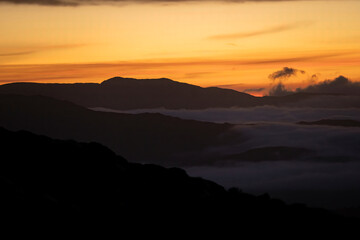 Fototapeta premium Incredible cloud inversion landscape view of the Rhinogydd in Snowdonia UK