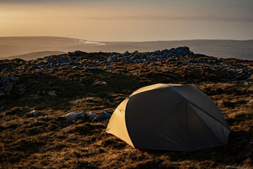 Incredible campsite view over a wild camping tent