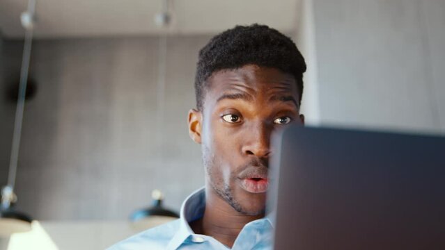 Young male communicating by videoconference