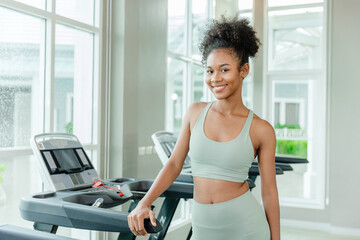 portrait healthy young teen black woman in sport club fitness happy smile.healthcare girl workout...