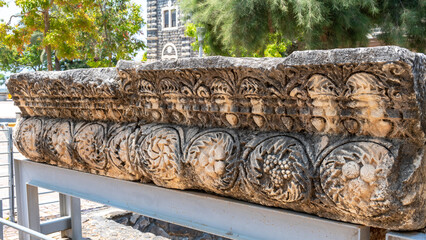 Carved decorative lintel at the ruins of Capernaum in Israel other names Kfar Nahum or Capharnaum.

