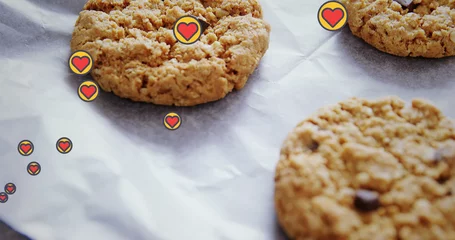 Schilderijen op glas Image of hearts floating over cookies on cooking paper © vectorfusionart