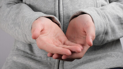 Fototapeta premium Palm of hands holding, giving, receiving something.