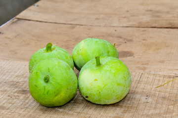 Fresh Tinda vegetable on the table. Fresh Tinda gourd for sale in market.